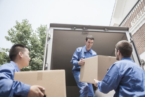 Furniture pick-up service handling a sofa removal in Highbury