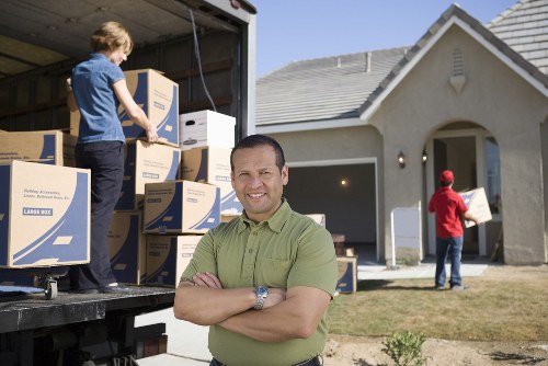Loading furniture into a van for a Highbury move