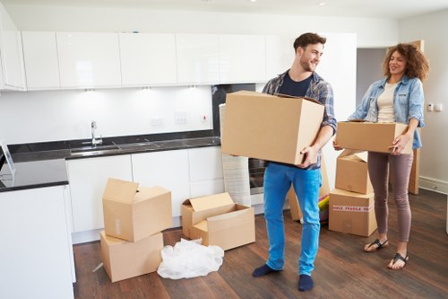 Boxes and office equipment prepared for a business move in Highbury