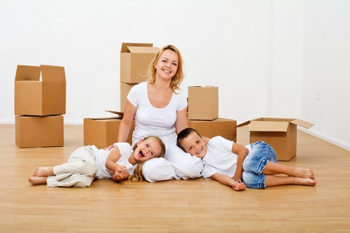 Movers checking equipment and securing items for transport