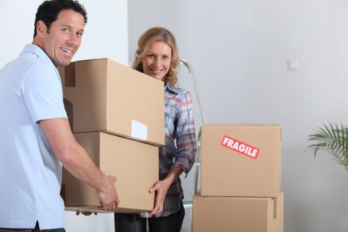 Packed business assets and labeled containers for a Highbury relocation